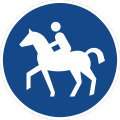 rundes Schild mit weißem Reiter auf blauem Grund