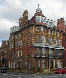 Buildings decorated with yellow faience include 4 King's Gardens, Hove. 4 King's Gardens, Hove.JPG