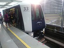 A Crystal Mover APM train on boarding A Crystal Mover LRT train on boarding.jpg