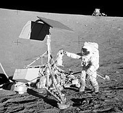 Apollo 12 astronaut Pete Conrad inspecting Surveyor 3. Lunar Module is seen in the background. 1969 Apollo12ConradSurveyor.jpg