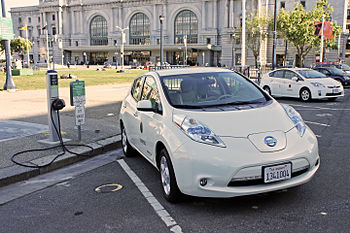 Nissan Leaf at a public charging station in front of San Francisco City Hall