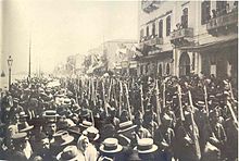 Greek troops marching on Izmir's coastal street, May 1919. Greek army Smyrne 1919.jpg