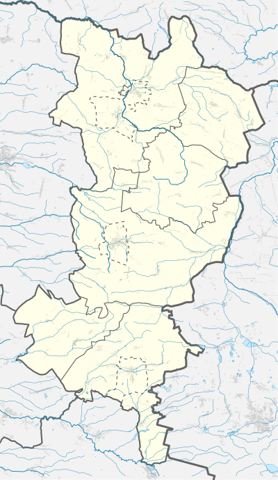 Mapa konturowa powiatu oleskiego, blisko górnej krawiędzi nieco na lewo znajduje się punkt z opisem „Kosowice-Uszyce”