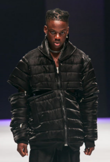 Rema catwalk for UK apparel brand Tokyo James in 2019