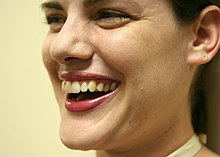 Women find humorous men more attractive. Smiling Laughing Woman IMG 5086.jpg
