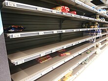 Empty supermarket shelves in Annonay, France, on 14 March 2020. Super U - des rayons vides.jpg