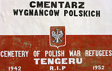 Tablica na murze polskiego cmentarza w Tengeru.
