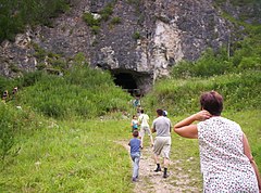 Tourists in front of the cave