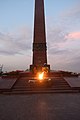 The eternal flame at the memorial in the night time