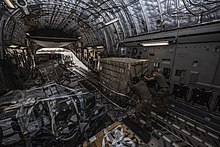 US Air Force personnel unload a C-17 aircraft carrying medical supplies in Niamey, Niger, in April 2020. Air Forces Africa delivers medical supplies to Ghana (49829156488).jpg