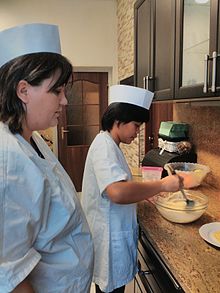 Cook with her apprentice, Euroinstitut vocational school, Czech Republic Apprentice-school-Euroinstitut.jpg