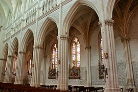 Ex-voto couvrant le mur du collatéral Nord