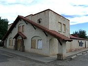 The West Valley Academy Building was built in 1930 and is located at 827 E. Monroe Ave. It originally was used as a church. Listed as historical by the Buckeye Valley Historical and Archaeological Society.