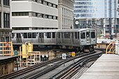 De loop op de hoek van Lake Street en Wabash Avenue