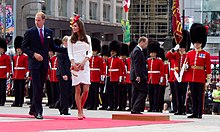 Prince William and the Duchess of Cambridge at an inspection for the Governor General's Foot Guards during their 2011 royal tour of Canada. Canada Ottawa William Kate 2011 (2).jpg