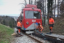 Most derailments, such as this one in Switzerland, are minor and do not cause injuries or damage. Derailment Repair (4213647132).jpg
