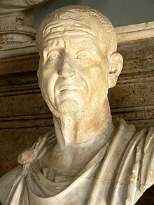 A marble bust of the Roman Emperor Decius from the Capitoline Museum, conveying "an impression of anxiety and weariness, as of a man shouldering heavy [state] responsibilities" Emperor Traianus Decius (Mary Harrsch).jpg
