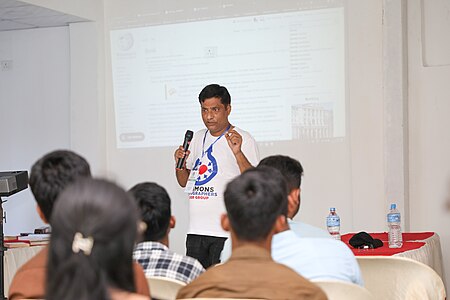 Wikimedians motivating students in a Workshop