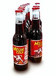 Un lot de 9 bouteilles de Meuh Cola de 27,5 cl, le cola alternatif "Made in Normandy" au léger goût caramélisé.