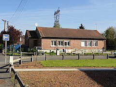 Des habitations post-Nationalisation groupées par deux.