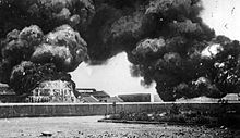 Oil tanks burning at Madras Bombardment of Madras by S.S. Emden 1914.jpg