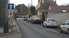 Panneau C12 sur une rue en agglomération