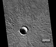 Fresh crater, as seen by HiRISE under HiWish program This is a young crater because one can easily see the rim and ejecta. They have not yet been eroded.