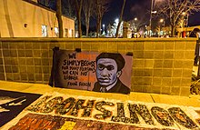 Banner outside the Minneapolis Police Department fourth precinct.