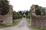 Gatepiers to inner court in front of Old Gwernyfed with garden walls on each side.