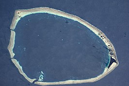 Het atol vanuit de ruinte (Foto:NASA).