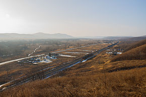 Фотография посёлка со склона сопки Зубятка