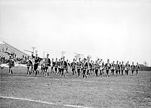 The University of Detroit Band performing at Dinan Field in the 1920s. 1920's band on football field.jpg