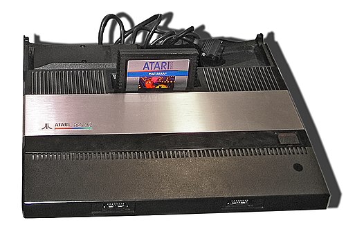 Atari 5200 game console with Pac Man game cartridge.