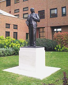 A statue of Clement Attlee in bronze