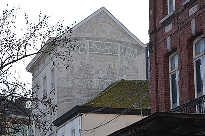 Peinture murale par Silvio Gigli sur le pignon de la Maison du tourisme.