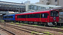 EV-E801 at Oiwake Station, Akita EV-E801 G1 train set at Akita 20190803a.jpg