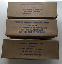 Three packages of government cheese.