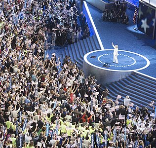 Hillary Clinton arrives on stage at the DNC