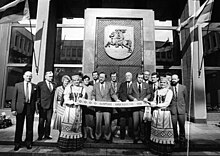 Vytautas Landsbergis near the primary Seimas door with the recently added Vytis above them, in 1990. KlpUniversitetasVlns90-10-5.jpg