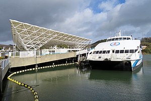 A triangular lattice building and a catamaran ferry