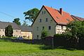 Einfriedungs- bzw. Hofmauer entlang der straßenseitigen Grundstücksgrenze