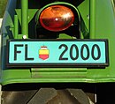 Grünes Kontrollschild für landwirtschaftliche Fahrzeuge