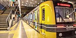 A Subte train at San José de Flores station in 2013