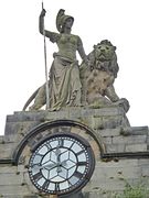 Sculpture of Britannia above a clock was added atop the Old Academy in Perth in 1886[9]