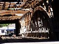 Mansfield Covered Bridge, Parke County, Indiana. The roof was missing after a major storm and the interior design was easier to see.