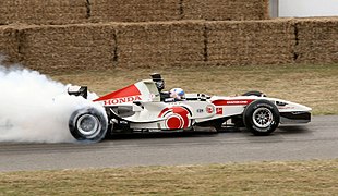 Burn d'une F1 au festival de vitesse de Goodwood (2006).