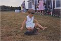 John F. Kennedy Jr. with one of Pushinka's puppies at Squaw Island, Hyannis Port, 14 August 1963