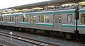 Intermediate motor car MoHa E501-7 showing the modified opening side windows, February 2009