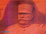 The head of Joffre carved into the Mondement column.
