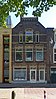 Voormalig pakhuis met Jugendstil motieven, nu bedrijfsruimte met bovenwoning (Gouda-Centrum)